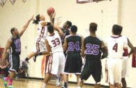 Naji Jackson drives to the basket as Teddy Howard (#33) and Nate Washington (#4) get offensive rebounding position. Photo by Andrea Stein