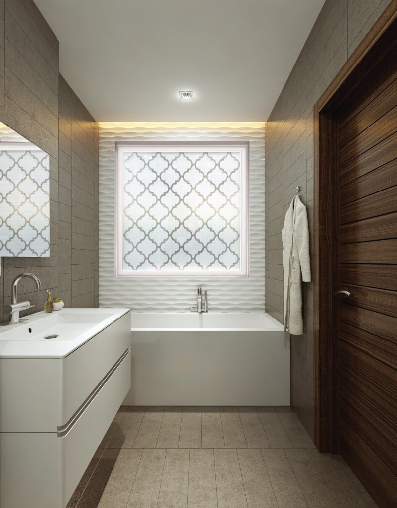 Elegant privacy windows and upgraded fixtures can enhance a bathroom. 