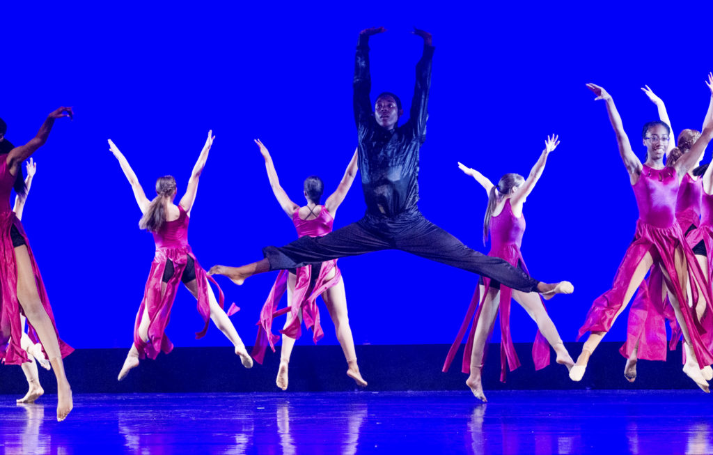Chris Miller is performing one of his near-perfect moves above ground, with the Hammond High Junior Dance Company performing "Can You See a Silhouette?" choreographed by Kerry Johnson.