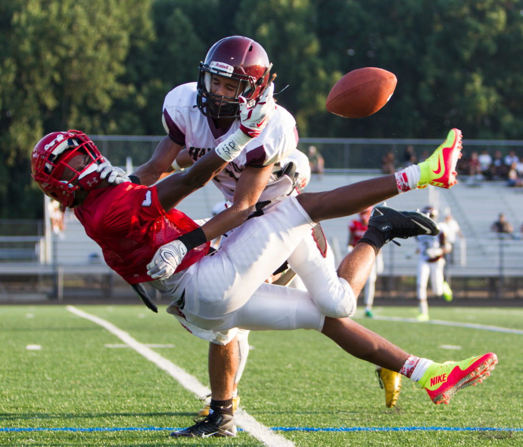 Hammond High School safety Paskell Cheeves knocks the football away from an Edmondson Red Storm receiver during a preseason scrimmage in Columbia Friday evening. Edmondson Westside High School defeated the Golden Bears 12-0.
