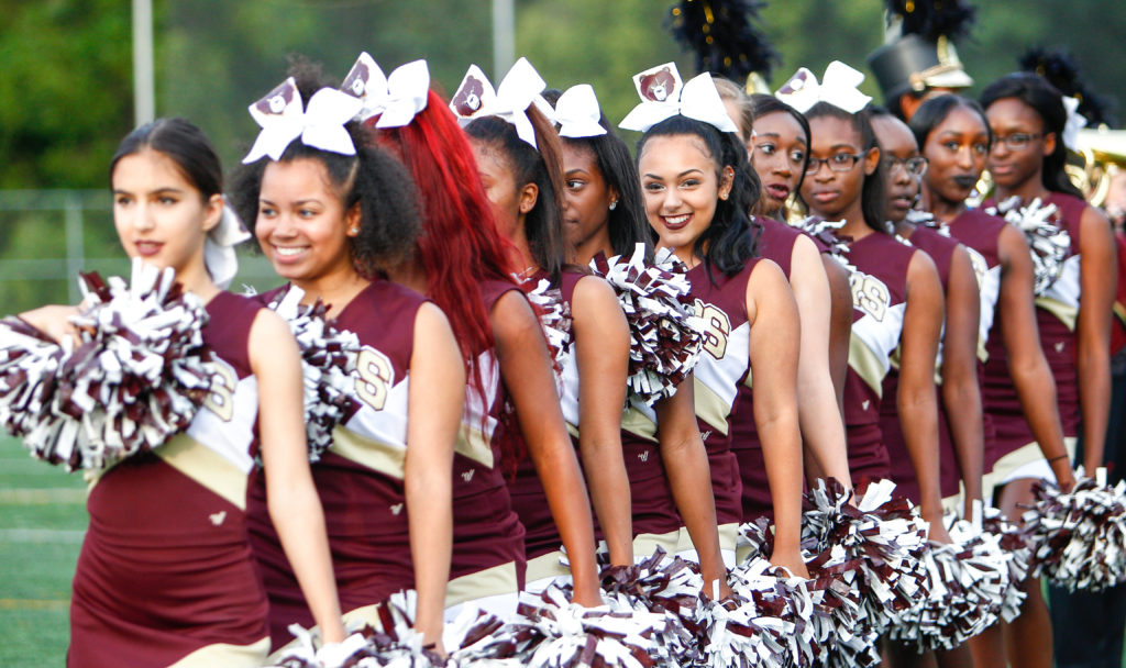 The Hammond varsity cheer squad gets ready to fire up the crowd before Friday's 2016 season opener against the Centennial Eagle football squad. The Eagles defeated the Golden Bears, 30-21.