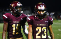 Hammond Golden Bear football players Kirkland Wise (left) and Paskel Cheeves head toward the HHS sideline in the third quarter of Glenelg's 44-0 victory at Golden Bear Stadium Friday evening. Wise caught two passes for 45 yards. Cheeves intercepted a Glenelg pass in the second quarter.  Photo by  YANAIR PHOTOGRAPHY.