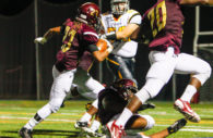 Hammond Golden Bear Paskel Cheeves returns the first of his two interceptions inside the Mt. Hebron 5-yard line during the third quarter of high school football action Friday at Hammond High School's Golden Bear Stadium. Mt. Hebron held on for a 21-14 win against Hammond.