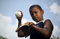 BUBA Baseball--the Baltimore Urban Baseball Association-- encourages Baltimore city kids to come out and “play ball.” (Stock Photo)