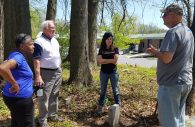 Bessie Bordenave, Fred Dorsey, Julie Schablitsky, and Wayne Davis gathered at the Guilford  Quarry Cemetery in Kings Contrivance, investigating the Howard County history from the 1800s. (Photo by Ricardo Whitaker)