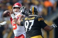 Sep 16, 2018; Pittsburgh, PA, USA;  Kansas City Chiefs quarterback Patrick Mahomes (15) passes against pressure from Pittsburgh Steelers defensive tackle Cameron Heyward (97) during the fourth quarter at Heinz Field. Kansas City won 42-37. Mandatory Credit: Charles LeClaire-USA TODAY Sports
