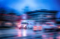 Stock photo of ambulance in response to accident - this is not an actual scene photo.