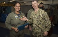 Lt. Cmdr. Angela Domingos (left) a Columbia, Maryland, serves on the USS Gerald R. Ford'. (Photo by Mass Communication Specialist 3rd Class Ryan Carter)