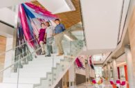 The ISLB atrium offers spaces to study or just relax. The art installation and a floating staircase add a whimsical, creative feel. (photo by Marlayna Demond ’11 for UMBC)