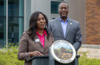 Howard County Library System President and CEO Tonya Aikens with Howard County Executive Calvin Ball at public announcement regarding upgrades for Elkridge