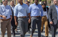 Howard County Executive Calvin Ball (center right) with Maryland Governor Wes Moore (center left) in an undated photo walking Ellicott City. Photo Courtesy: Howard County Government.